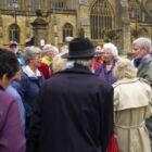 Guide Peter Welton tells members about the history of Sherborne Abbey (MS)