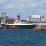 Preserved tug Calshot, the old Southampton Terminus station building in the background